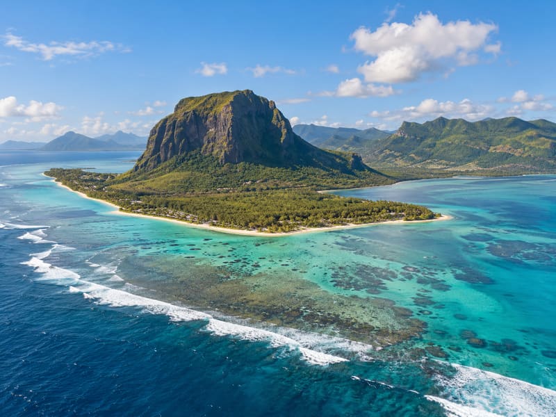 Illustration: Le Morne Brabant above a turquoise lagoon, Mauritius